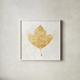 Bronzed Leaf I by Sue Schlabach. Shown in a crisp white glass frame for a clean and minimalist style. Available as an archival giclee rolled canvas, fine art paper, or poster print. SKU 21195a.