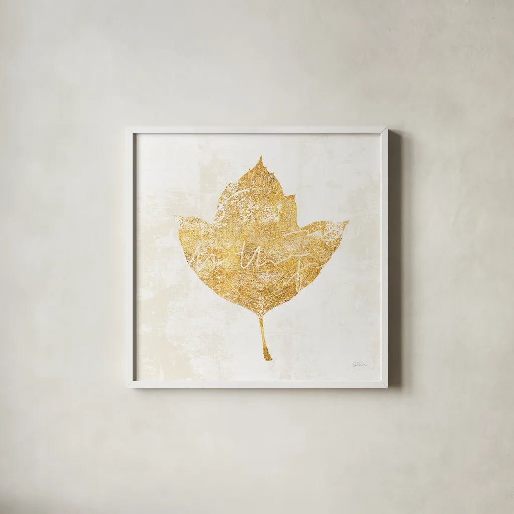 Bronzed Leaf I by Sue Schlabach. Shown in a crisp white glass frame for a clean and minimalist style. Available as an archival giclee rolled canvas, fine art paper, or poster print. SKU 21195a.