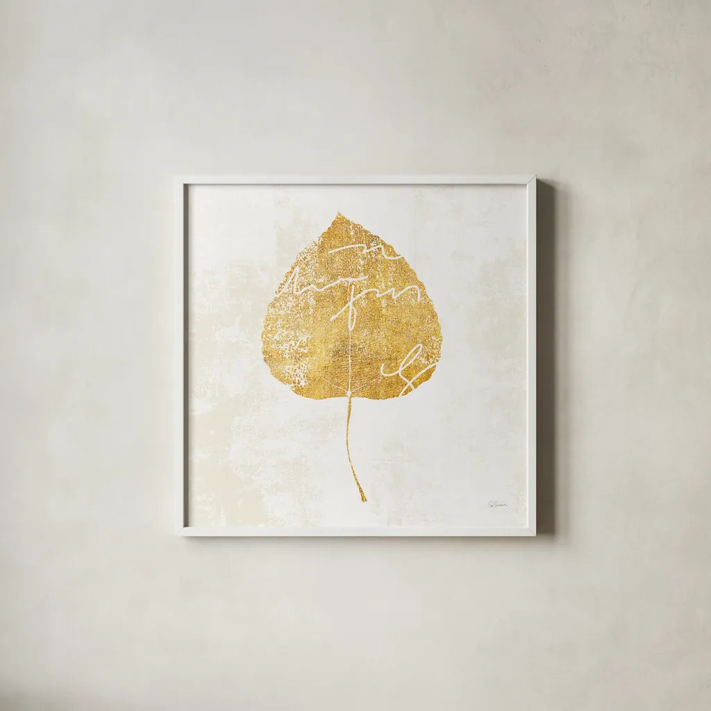 Bronzed Leaf II by Sue Schlabach. Shown in a crisp white glass frame for a clean and minimalist style. Available as an archival giclee rolled canvas, fine art paper, or poster print. SKU 21196a.
