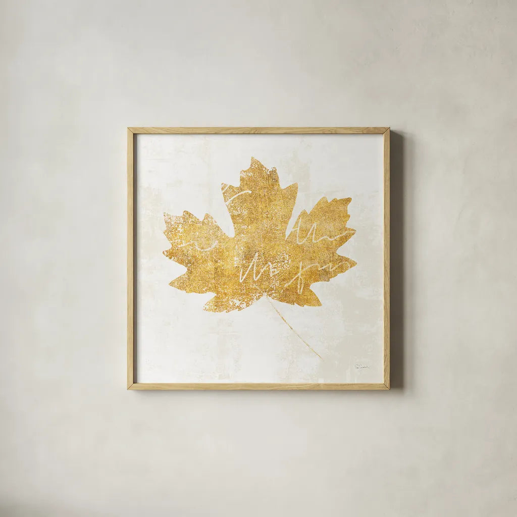 Bronzed Leaf IV by Sue Schlabach. Shown in a natural wood glass frame for a timeless modern aesthetic. Available as an archival giclee rolled canvas, fine art paper, or poster print. SKU 21198a.
