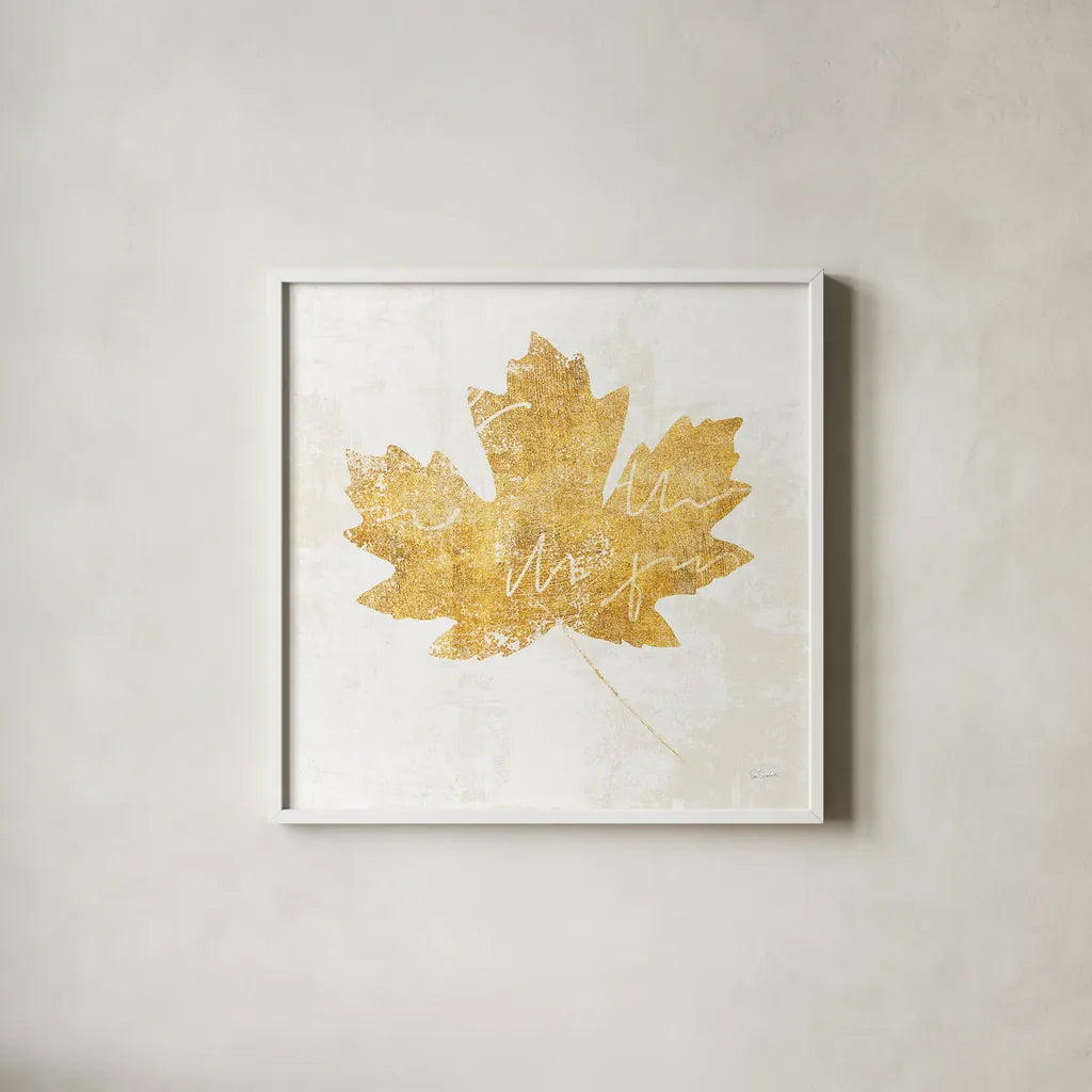 Bronzed Leaf IV by Sue Schlabach. Shown in a crisp white glass frame for a clean and minimalist style. Available as an archival giclee rolled canvas, fine art paper, or poster print. SKU 21198a.