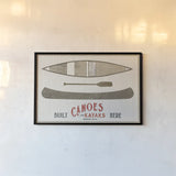 Cabin Life VII Kayak by Sue Schlabach. shown as a paper print in a black flame. Available as a archival giclee rolled canvas, fine art paper, or poster print. SKU 53655i.