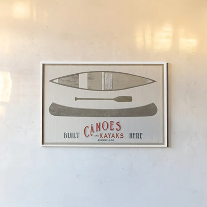 Cabin Life VII Kayak by Sue Schlabach. shown as a paper print in a white frame. Available as a archival giclee rolled canvas, fine art paper, or poster print. SKU 53655i.