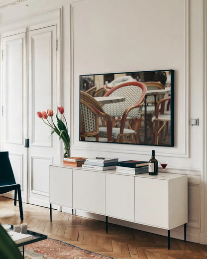 Cafe in Paris I by Sue Schlabach. shown as a framed stretched canvas in a living room above a console. Available as a archival giclee rolled canvas, fine art paper, or poster print. SKU 34158i.