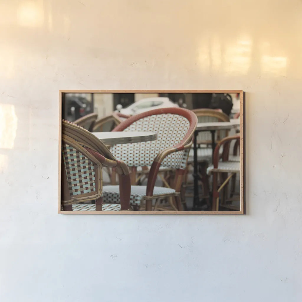 Cafe in Paris I by Sue Schlabach. shown as a paper print in a natural frame. Available as a archival giclee rolled canvas, fine art paper, or poster print. SKU 34158i.