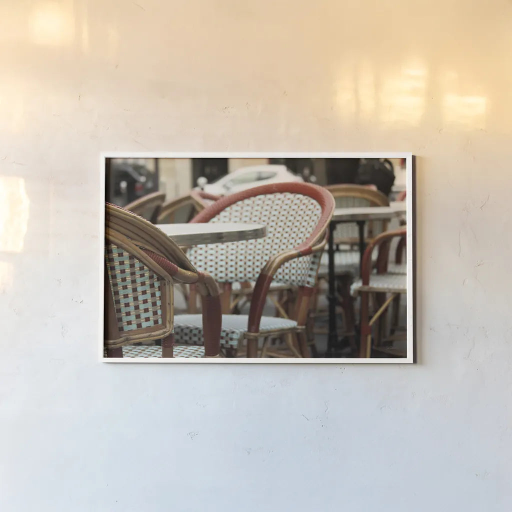 Cafe in Paris I by Sue Schlabach. shown as a paper print in a white frame. Available as a archival giclee rolled canvas, fine art paper, or poster print. SKU 34158i.