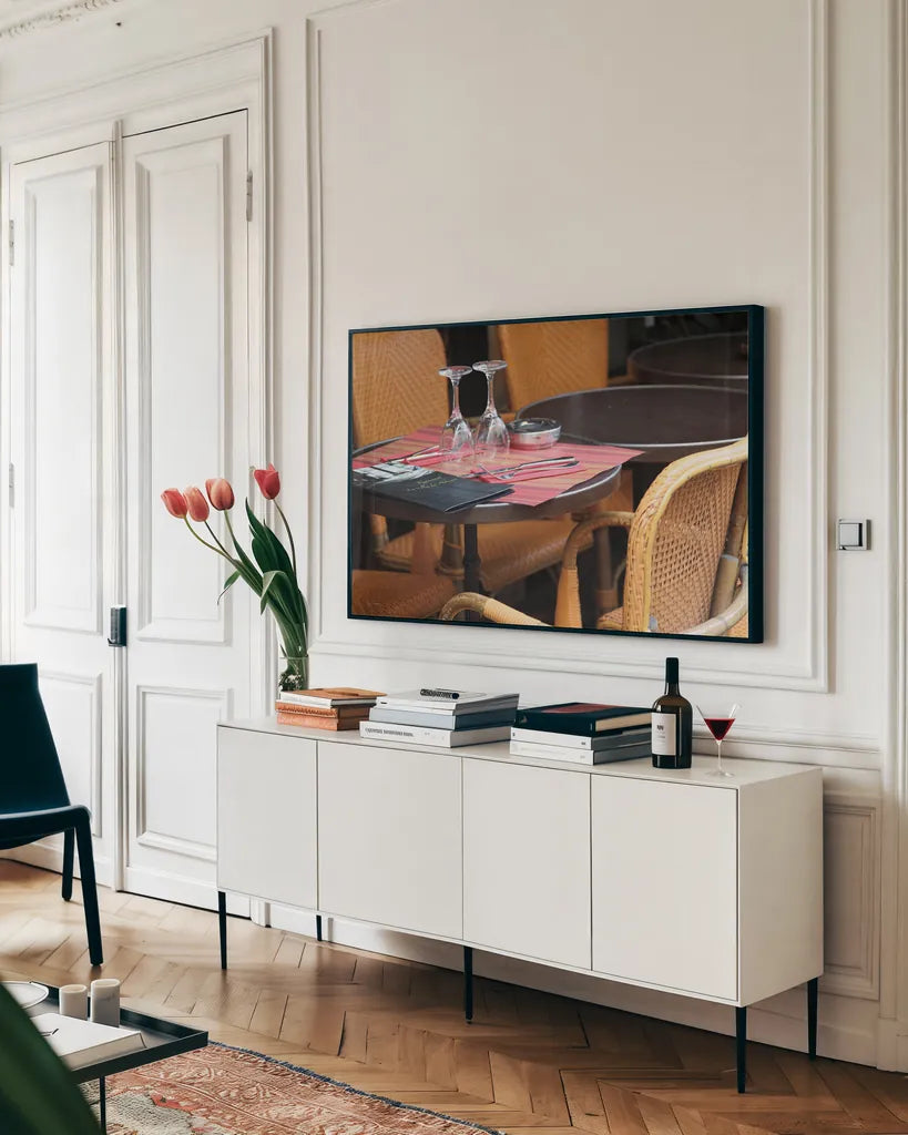 Cafe in Paris II by Sue Schlabach. shown as a framed stretched canvas in a living room above a console. Available as a archival giclee rolled canvas, fine art paper, or poster print. SKU 34159i.