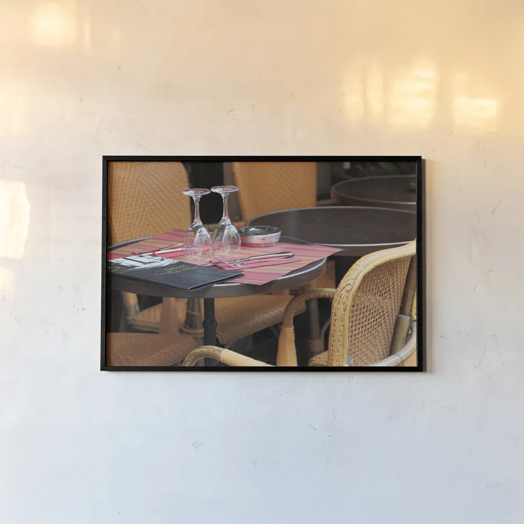 Cafe in Paris II by Sue Schlabach. shown as a paper print in a black flame. Available as a archival giclee rolled canvas, fine art paper, or poster print. SKU 34159i.