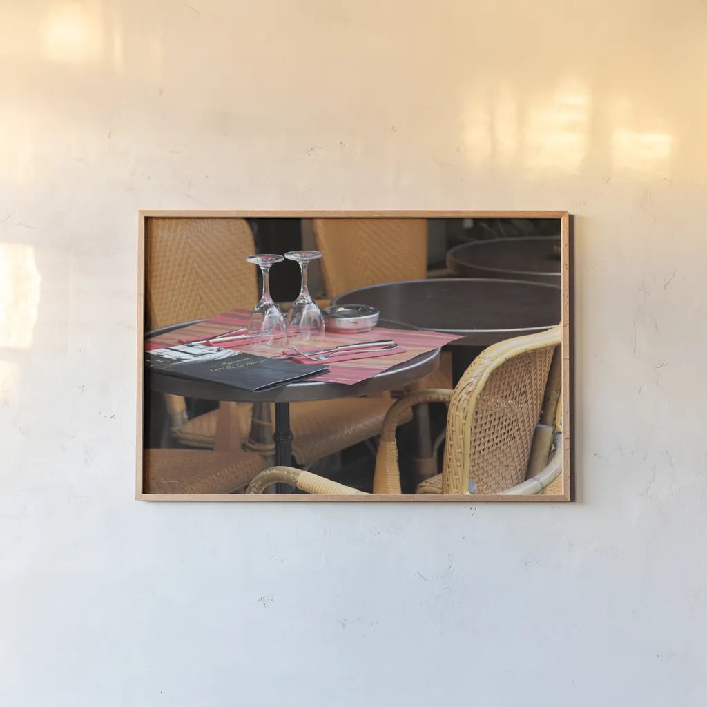 Cafe in Paris II by Sue Schlabach. shown as a paper print in a natural frame. Available as a archival giclee rolled canvas, fine art paper, or poster print. SKU 34159i.