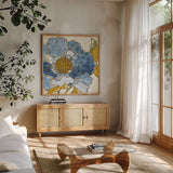 Camilles Peony I Indigo by Sue Schlabach. Shown in a natural wood frame in a cozy modern living room. Available as an archival giclee rolled canvas, fine art paper, or poster print. SKU 23970a.