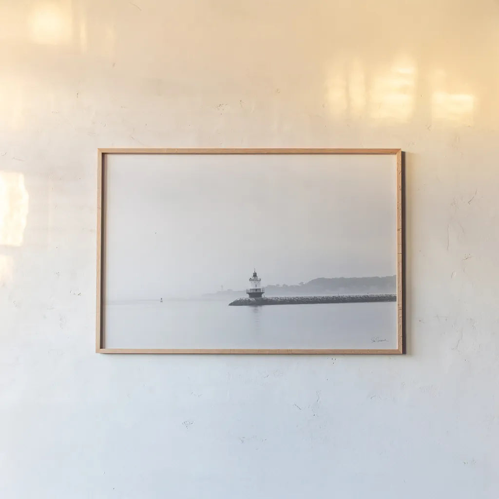 Casco Bay Lighthouse II by Sue Schlabach. shown as a paper print in a natural frame. Available as a archival giclee rolled canvas, fine art paper, or poster print. SKU 72425i.