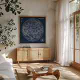 Celestial Blueprint by Sue Schlabach. Shown in a natural wood frame in a cozy modern living room. Available as an archival giclee rolled canvas, fine art paper, or poster print. SKU 11937a.