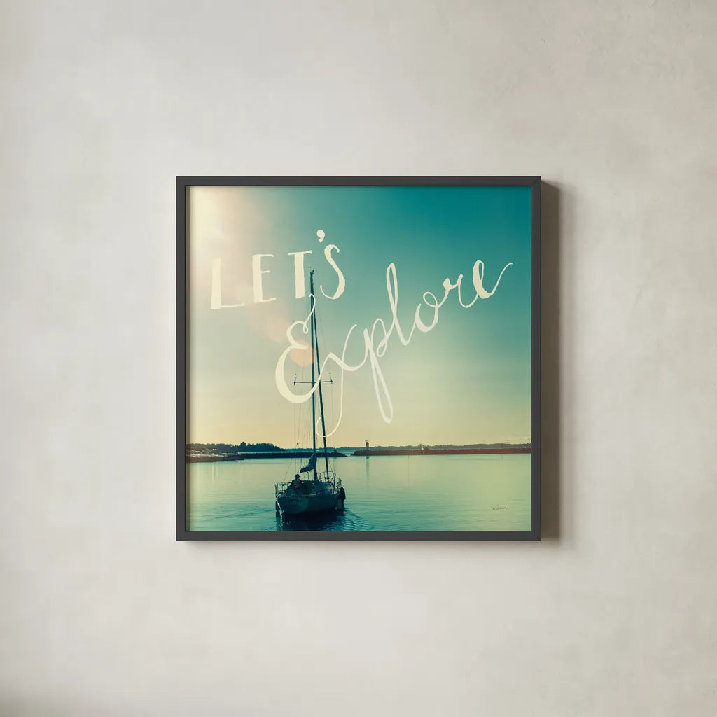 Coastline Sailboat Explore by Sue Schlabach. Shown in a sleek black glass frame for a contemporary gallery look. Available as an archival giclee rolled canvas, fine art paper, or poster print. SKU 15251a.