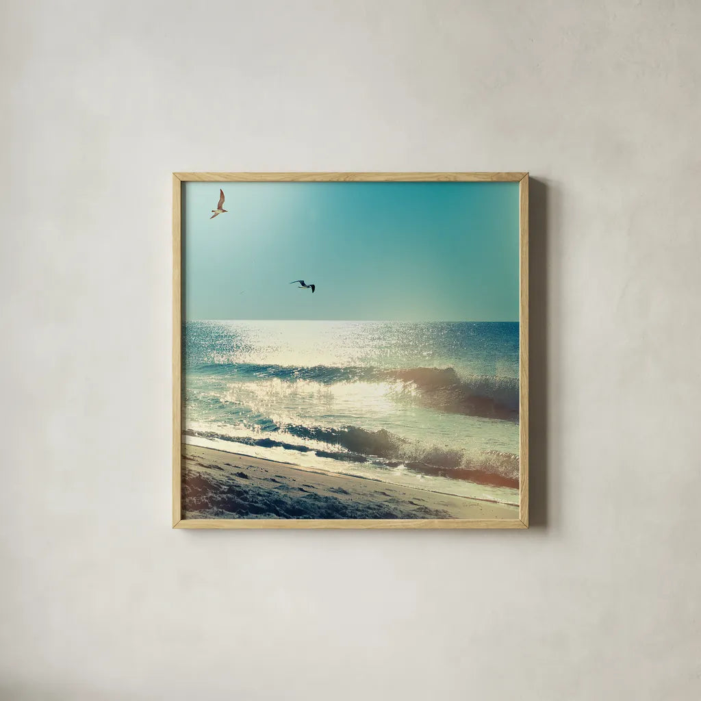 Coastline Waves no Word by Sue Schlabach. Shown in a natural wood glass frame for a timeless modern aesthetic. Available as an archival giclee rolled canvas, fine art paper, or poster print. SKU 33117a.