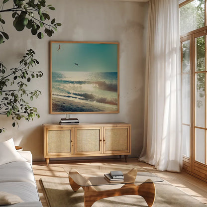 Coastline Waves no Word by Sue Schlabach. Shown in a natural wood frame in a cozy modern living room. Available as an archival giclee rolled canvas, fine art paper, or poster print. SKU 33117a.