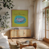 Colorful Coffee Cafe Parisien No Border by Sue Schlabach. Shown in a natural wood frame in a cozy modern living room. Available as an archival giclee rolled canvas, fine art paper, or poster print. SKU 44496a.
