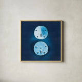 Cyanotype Sea IV by Sue Schlabach. Shown in a natural wood glass frame for a timeless modern aesthetic. Available as an archival giclee rolled canvas, fine art paper, or poster print. SKU 32597a.