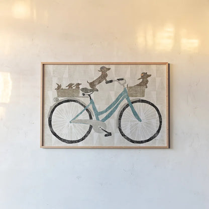 Doxie Ride ver II by Sue Schlabach. shown as a paper print in a natural frame. Available as a archival giclee rolled canvas, fine art paper, or poster print. SKU 22131i.