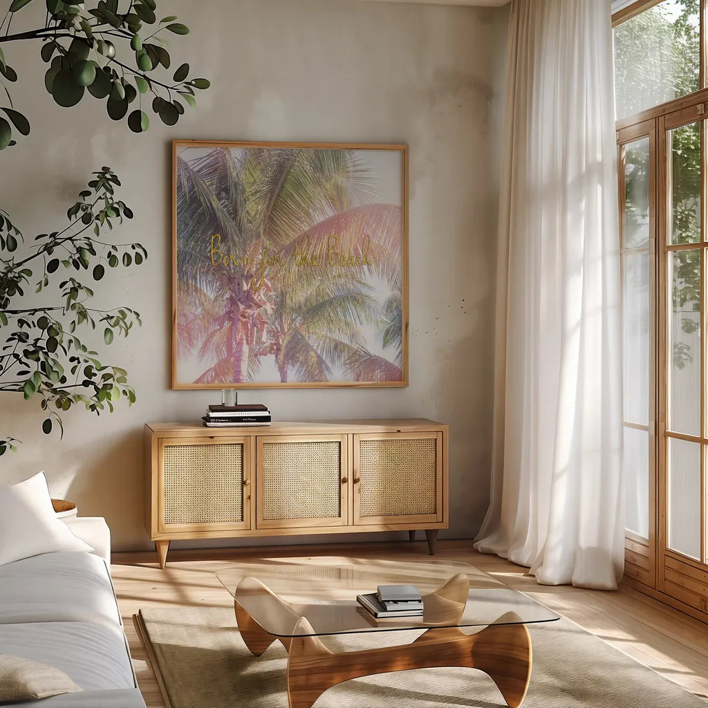 Dream Palm II Born for the Beach by Sue Schlabach. Shown in a natural wood frame in a cozy modern living room. Available as an archival giclee rolled canvas, fine art paper, or poster print. SKU 36334a.