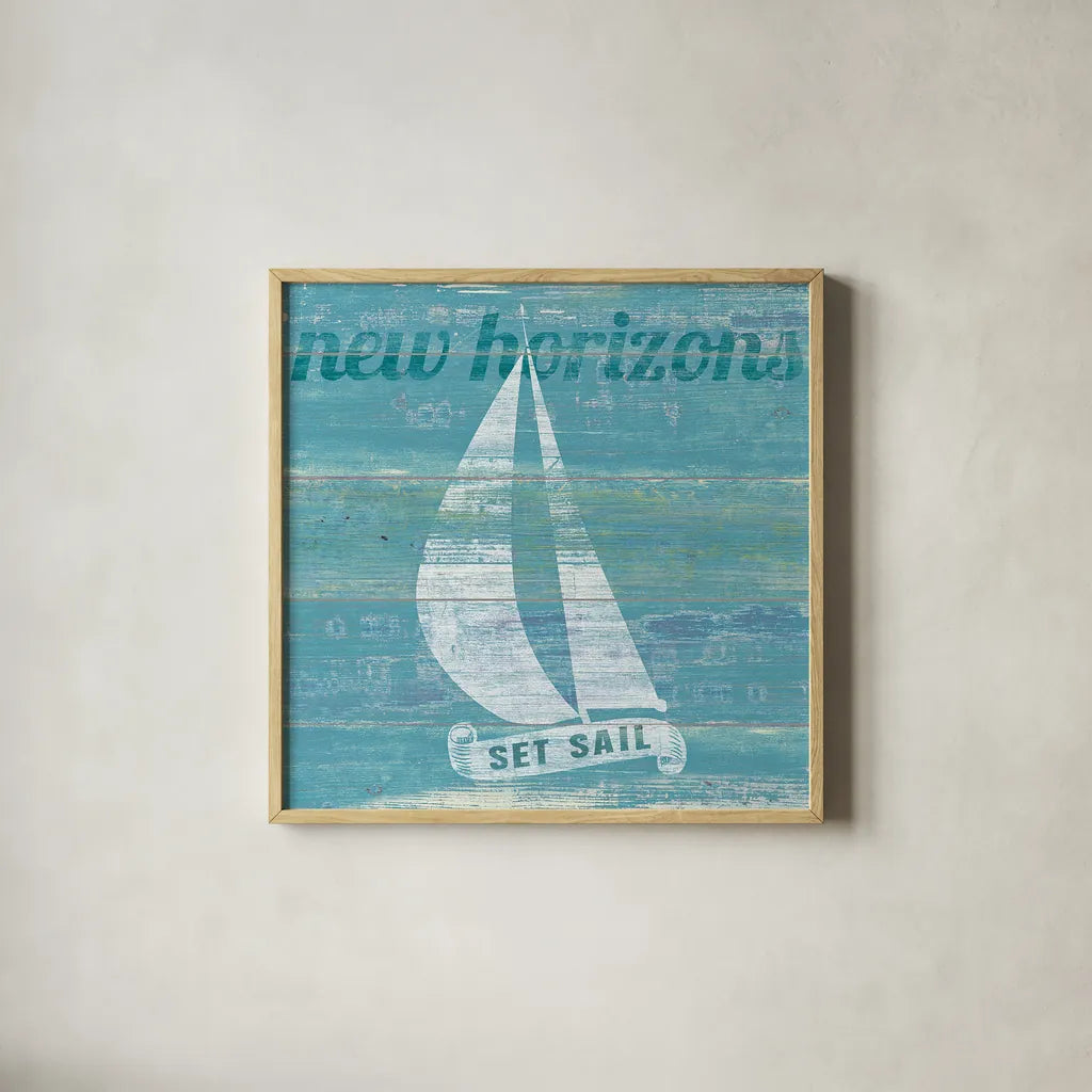 Drift Sailboat by Sue Schlabach. Shown in a natural wood glass frame for a timeless modern aesthetic. Available as an archival giclee rolled canvas, fine art paper, or poster print. SKU 18845a.