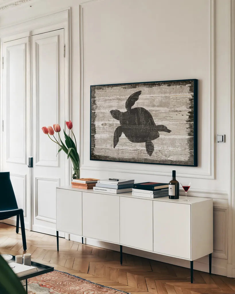 Driftwood Coast III by Sue Schlabach. shown as a framed stretched canvas in a living room above a console. Available as a archival giclee rolled canvas, fine art paper, or poster print. SKU 48730i.