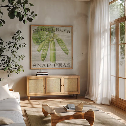 Farm Fresh Peas by Sue Schlabach. Shown in a natural wood frame in a cozy modern living room. Available as an archival giclee rolled canvas, fine art paper, or poster print. SKU 20841a.