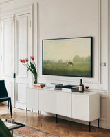 Farm Morning I by Sue Schlabach. shown as a framed stretched canvas in a living room above a console. Available as a archival giclee rolled canvas, fine art paper, or poster print. SKU 27056i.