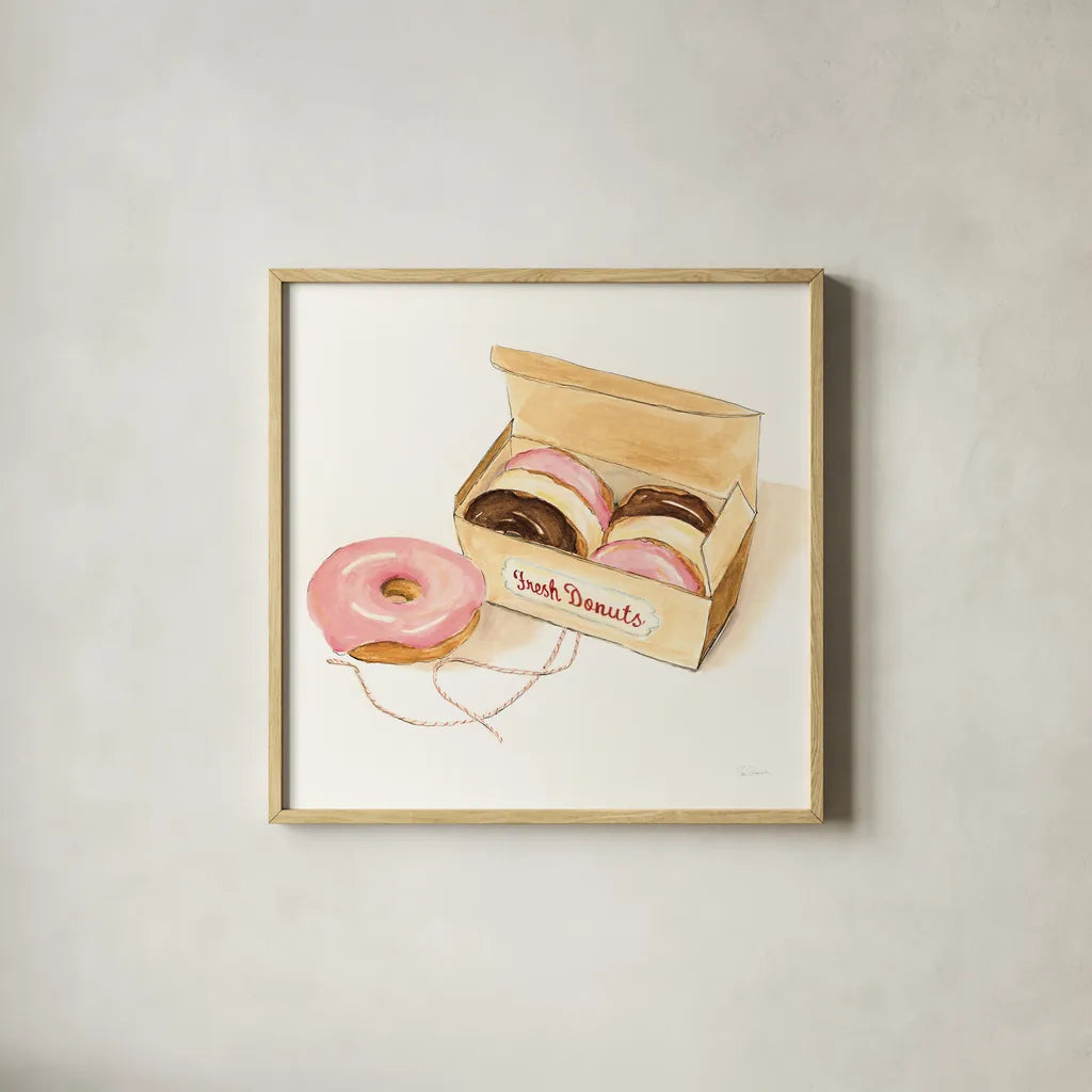 Fresh Donuts by Sue Schlabach. Shown in a natural wood glass frame for a timeless modern aesthetic. Available as an archival giclee rolled canvas, fine art paper, or poster print. SKU 100843a.