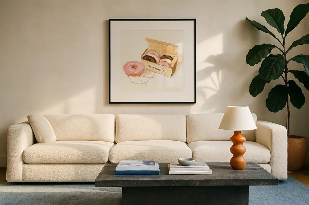 Fresh Donuts by Sue Schlabach. Displayed in a glass frame with matte in a clean modern living room. Available as an archival giclee rolled canvas, fine art paper, or poster print. SKU 100843a.