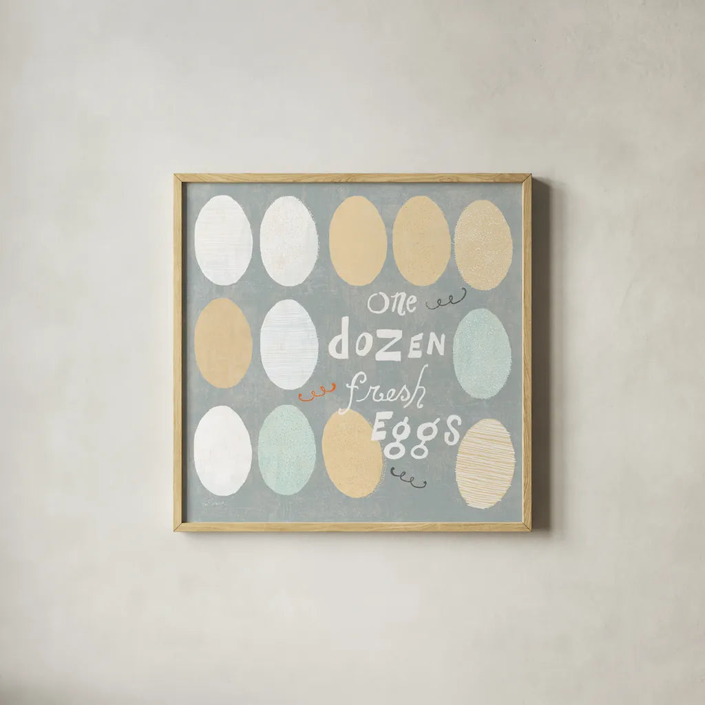 Fresh Eggs IV by Sue Schlabach. Shown in a natural wood glass frame for a timeless modern aesthetic. Available as an archival giclee rolled canvas, fine art paper, or poster print. SKU 31010a.