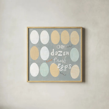 Fresh Eggs IV by Sue Schlabach. Shown in a natural wood glass frame for a timeless modern aesthetic. Available as an archival giclee rolled canvas, fine art paper, or poster print. SKU 31010a.