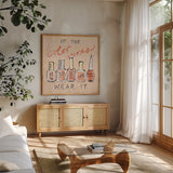 Geo Beauty and Sass I - Wear It by Sue Schlabach. Shown in a natural wood frame in a cozy modern living room. Available as an archival giclee rolled canvas, fine art paper, or poster print. SKU 39693a.