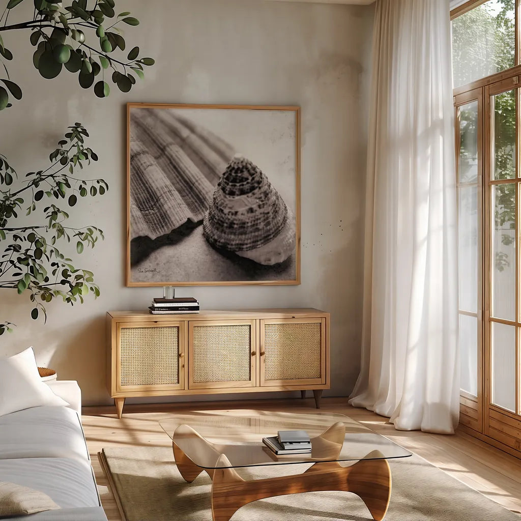Gifts from the Sea Square by Sue Schlabach. Shown in a natural wood frame in a cozy modern living room. Available as an archival giclee rolled canvas, fine art paper, or poster print. SKU 5846a.