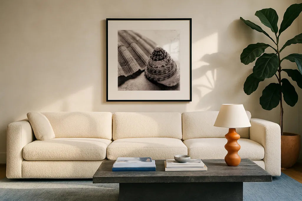 Gifts from the Sea Square by Sue Schlabach. Displayed in a glass frame with matte in a clean modern living room. Available as an archival giclee rolled canvas, fine art paper, or poster print. SKU 5846a.