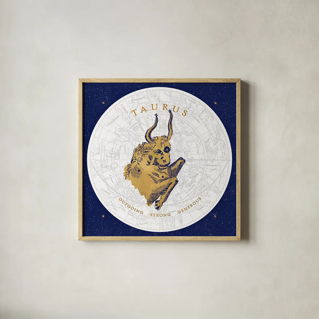Gilded Zodiac Taurus by Sue Schlabach. Shown in a natural wood glass frame for a timeless modern aesthetic. Available as an archival giclee rolled canvas, fine art paper, or poster print. SKU 18366a.