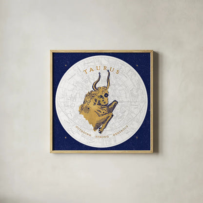 Gilded Zodiac Taurus by Sue Schlabach. Shown in a natural wood glass frame for a timeless modern aesthetic. Available as an archival giclee rolled canvas, fine art paper, or poster print. SKU 18366a.