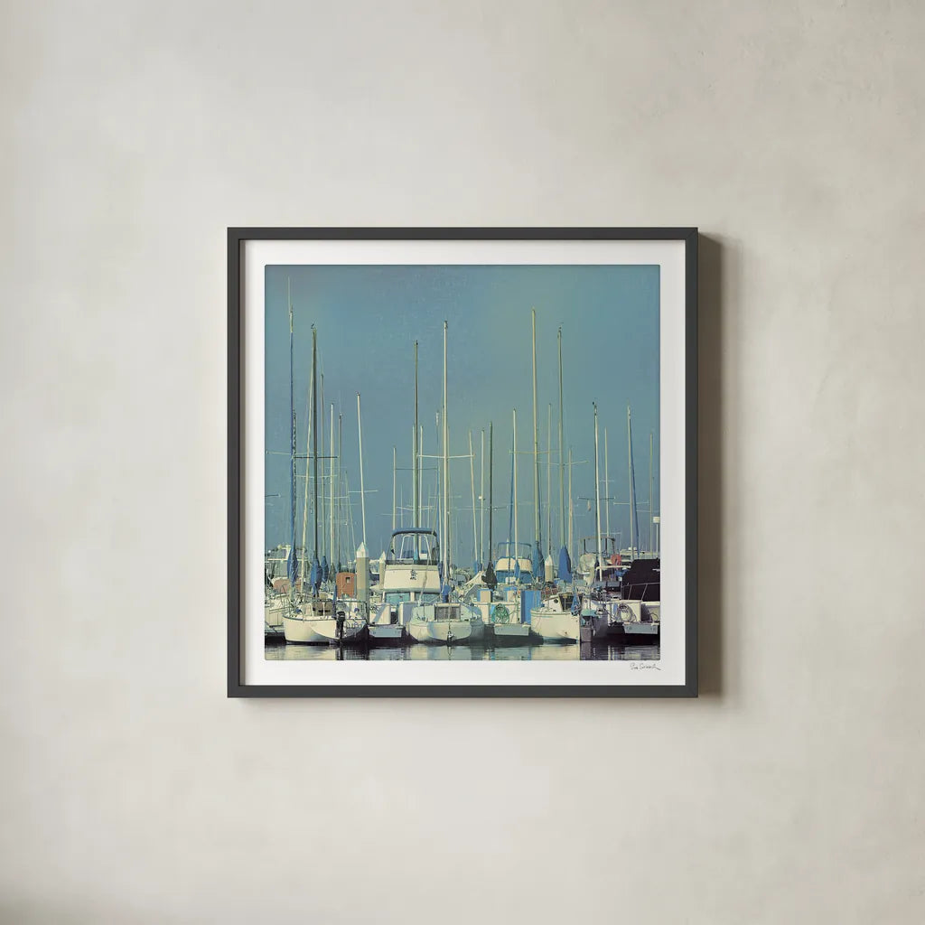 Harbor Boats Blue Sky by Sue Schlabach. Shown in a sleek black glass frame for a contemporary gallery look. Available as an archival giclee rolled canvas, fine art paper, or poster print. SKU 23865a.