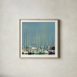 Harbor Boats Blue Sky by Sue Schlabach. Shown in a natural wood glass frame for a timeless modern aesthetic. Available as an archival giclee rolled canvas, fine art paper, or poster print. SKU 23865a.