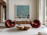 Harbor Boats Blue Sky by Sue Schlabach. Shown as extra-large giant wall art in a modern living room. Available as an archival giclee rolled canvas, fine art paper, or poster print. SKU 23865a.