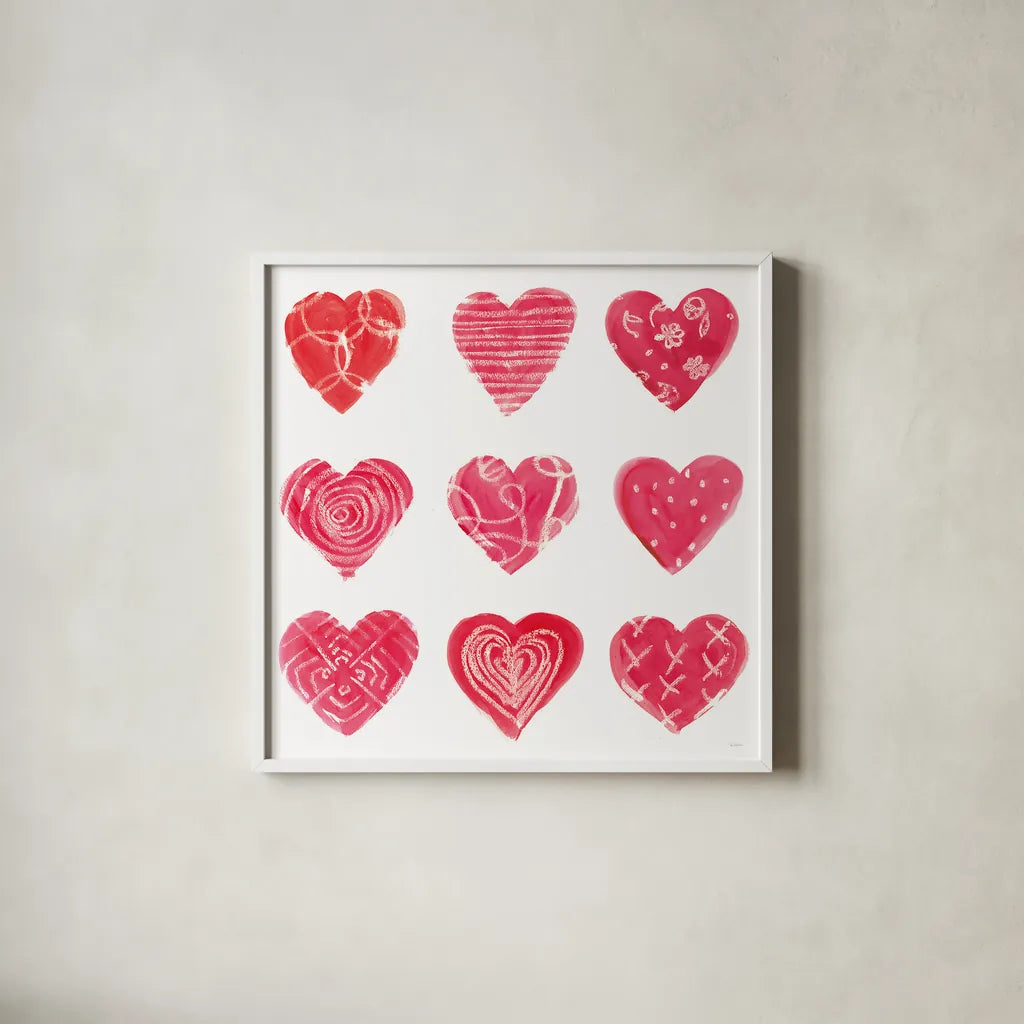 Hearts and More Hearts I by Sue Schlabach. Shown in a crisp white glass frame for a clean and minimalist style. Available as an archival giclee rolled canvas, fine art paper, or poster print. SKU 49988a.