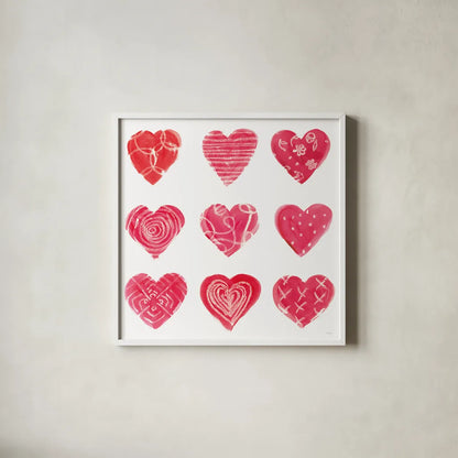 Hearts and More Hearts I by Sue Schlabach. Shown in a crisp white glass frame for a clean and minimalist style. Available as an archival giclee rolled canvas, fine art paper, or poster print. SKU 49988a.