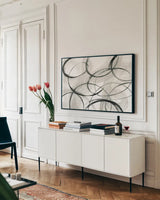 Imprints by Sue Schlabach. shown as a framed stretched canvas in a living room above a console. Available as a archival giclee rolled canvas, fine art paper, or poster print. SKU 30539i.