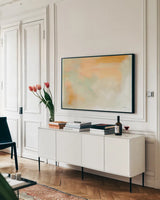 In the Pink by Sue Schlabach. shown as a framed stretched canvas in a living room above a console. Available as a archival giclee rolled canvas, fine art paper, or poster print. SKU 67144i.
