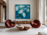 Ink Leaves I by Sue Schlabach. Shown as extra-large giant wall art in a modern living room. Available as an archival giclee rolled canvas, fine art paper, or poster print. SKU 32439a.