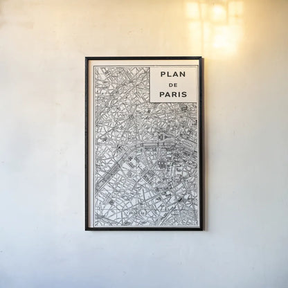 Inverted Paris Map by Sue Schlabach. shown as a paper print in a black flame. Available as a archival giclee rolled canvas, fine art paper, or poster print. SKU 70218h.