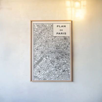Inverted Paris Map by Sue Schlabach. shown as a paper print in a natural frame. Available as a archival giclee rolled canvas, fine art paper, or poster print. SKU 70218h.
