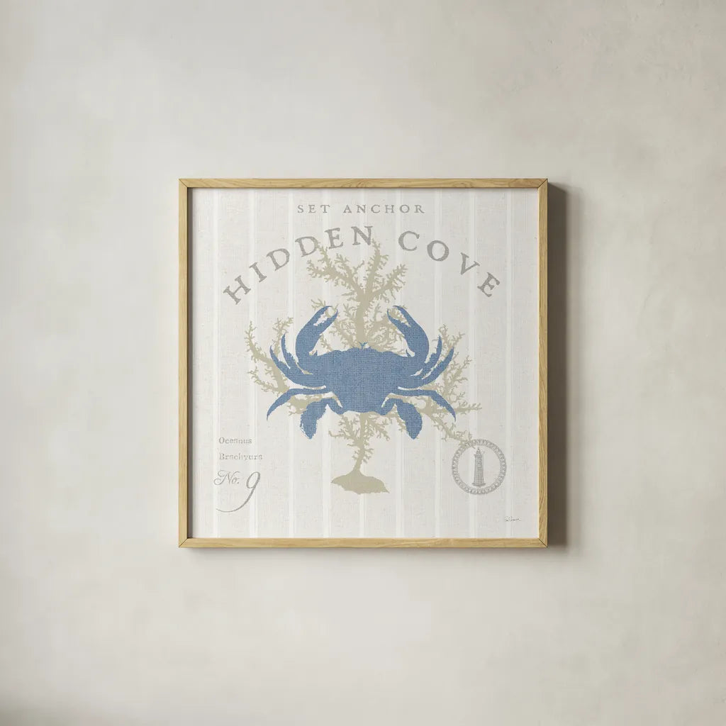 Island Findings II Blue by Sue Schlabach. Shown in a natural wood glass frame for a timeless modern aesthetic. Available as an archival giclee rolled canvas, fine art paper, or poster print. SKU 87626a.