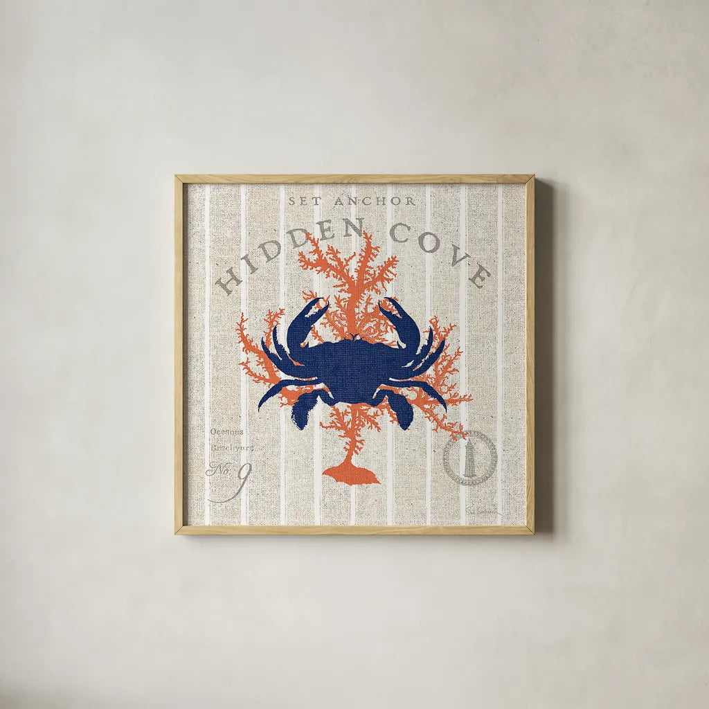 Island Findings II Crab by Sue Schlabach. Shown in a natural wood glass frame for a timeless modern aesthetic. Available as an archival giclee rolled canvas, fine art paper, or poster print. SKU 15099a.