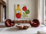 Italiano Peppers by Sue Schlabach. Shown as extra-large giant wall art in a modern living room. Available as an archival giclee rolled canvas, fine art paper, or poster print. SKU 44689a.