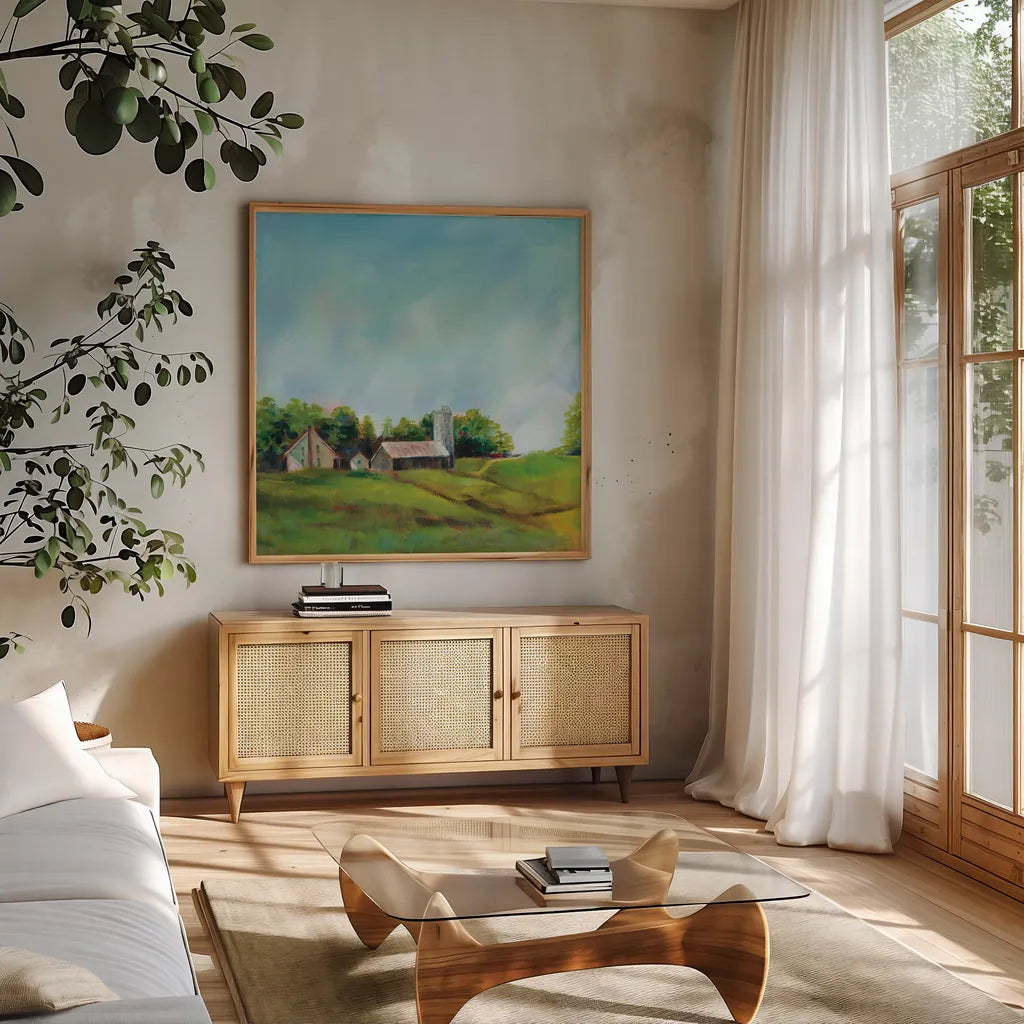 June Farm by Sue Schlabach. Shown in a natural wood frame in a cozy modern living room. Available as an archival giclee rolled canvas, fine art paper, or poster print. SKU 58312a.